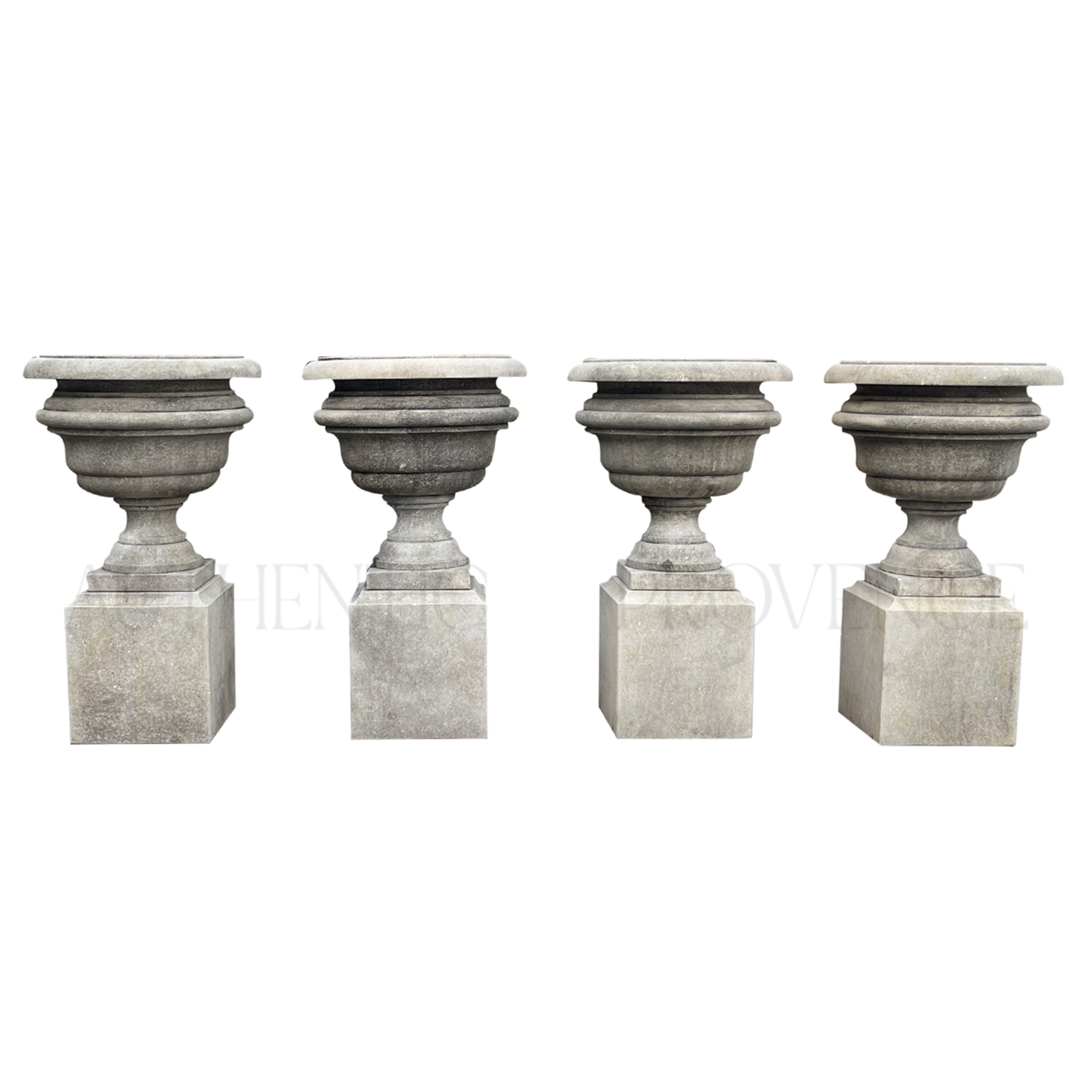 Set of Four 20th Century Limestone Urns
