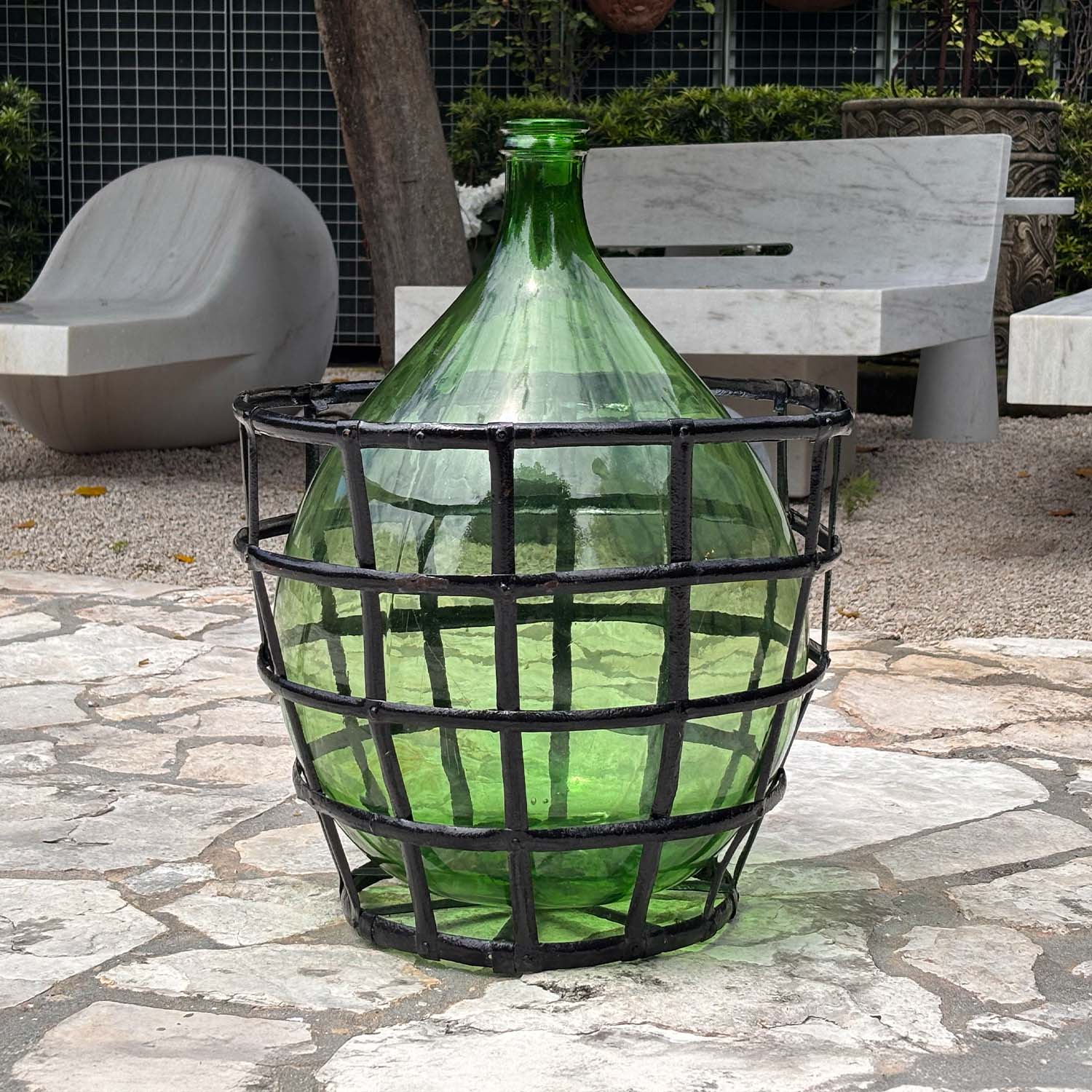 Bulbous Green Glass Vessel Encased in an Aluminum Basket