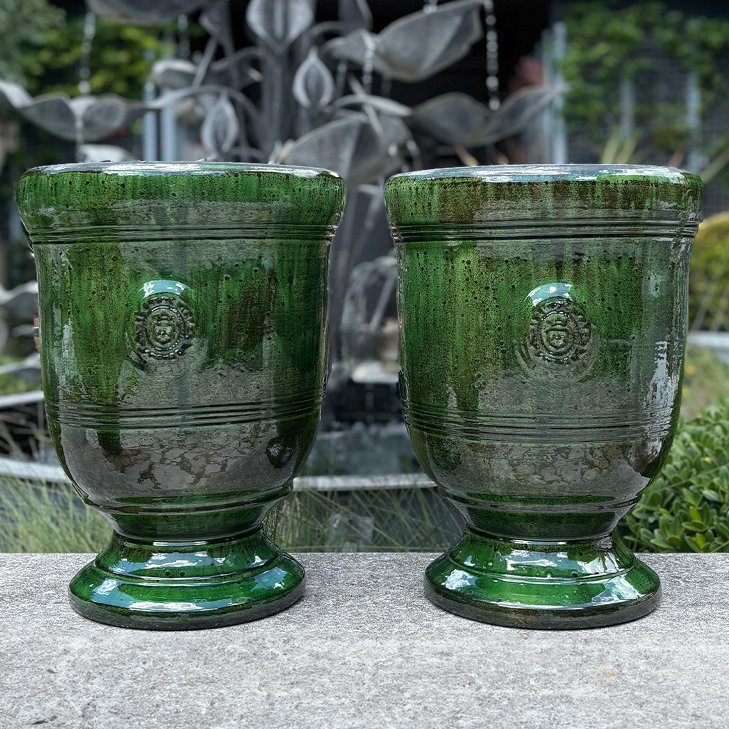 Pair of Dark Green Anduze Garden Planters with Medallions in Terra Cotta