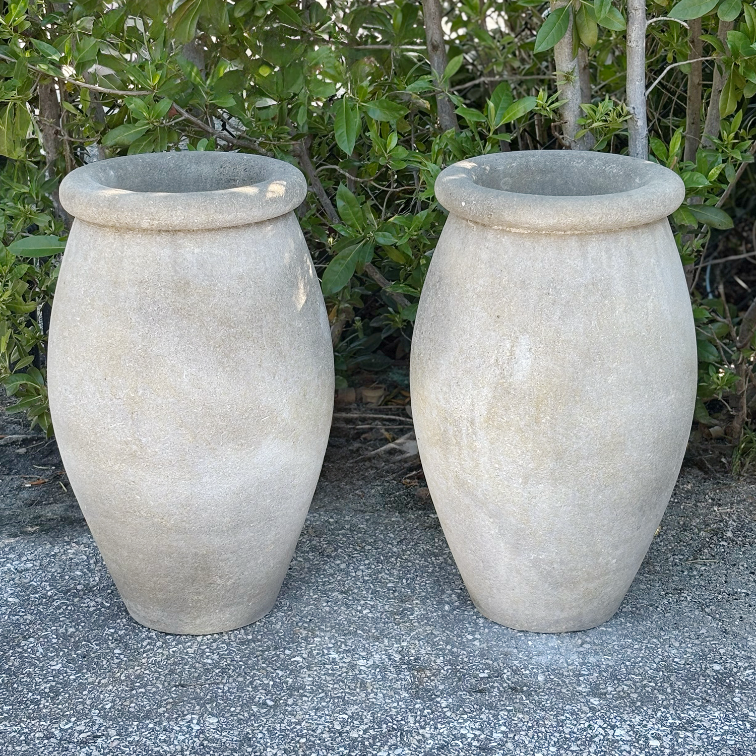 Pair of Neoclassical Style Limestone Urns from Italy