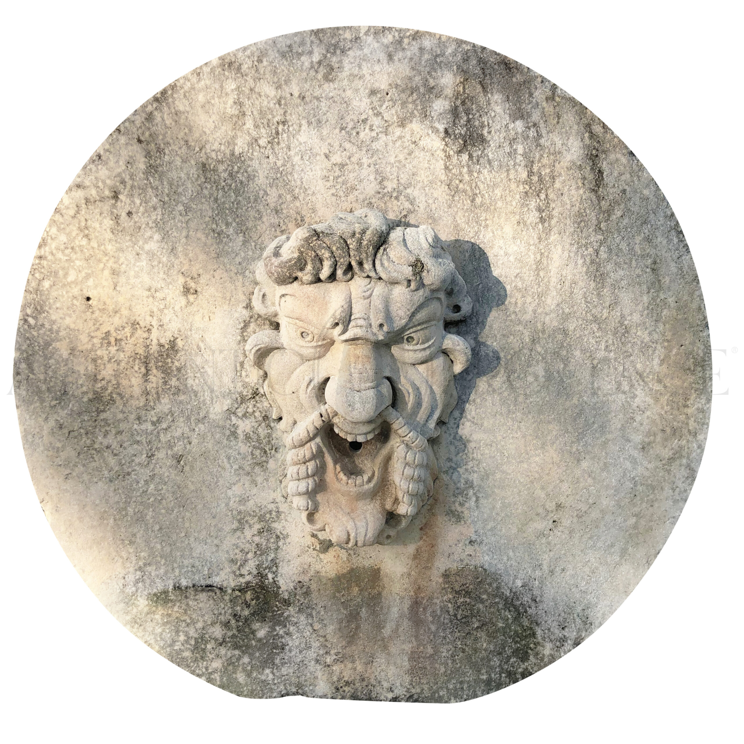 19th Century Carved Grinding Stone with a Centered Satyr Mask