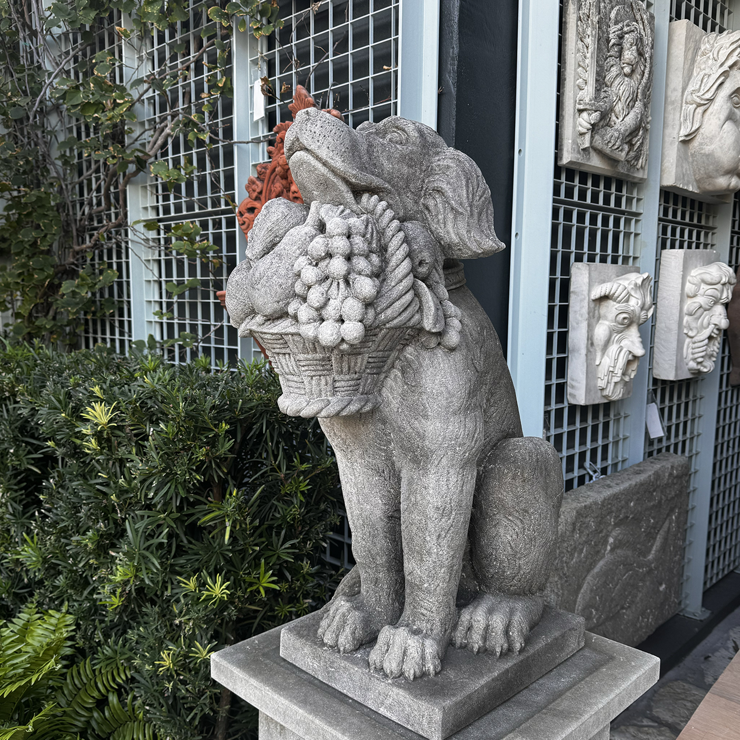 Pair of Hand Carved Stone Statues of Hunting Dogs