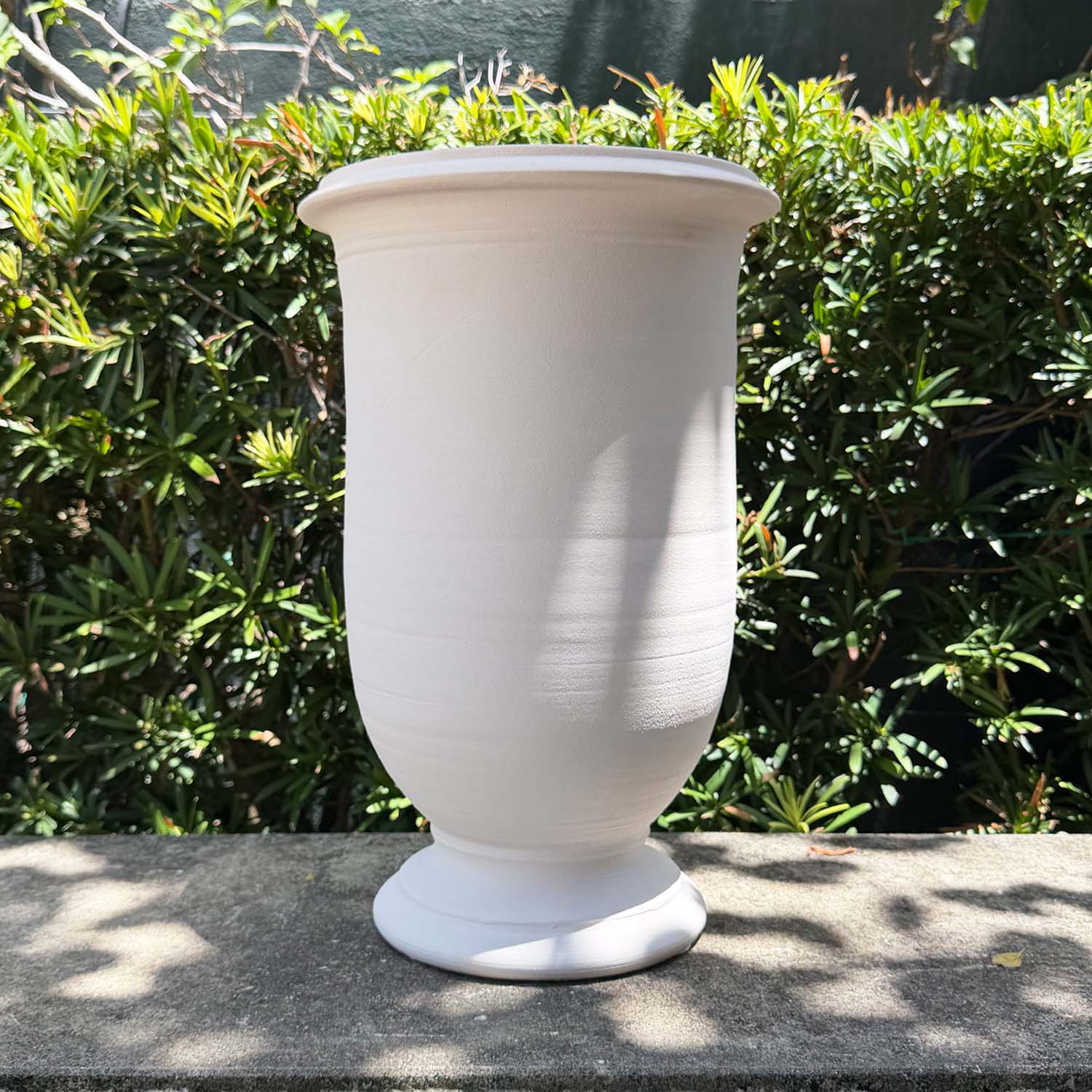 A Garden Urn with a Matt White Patina