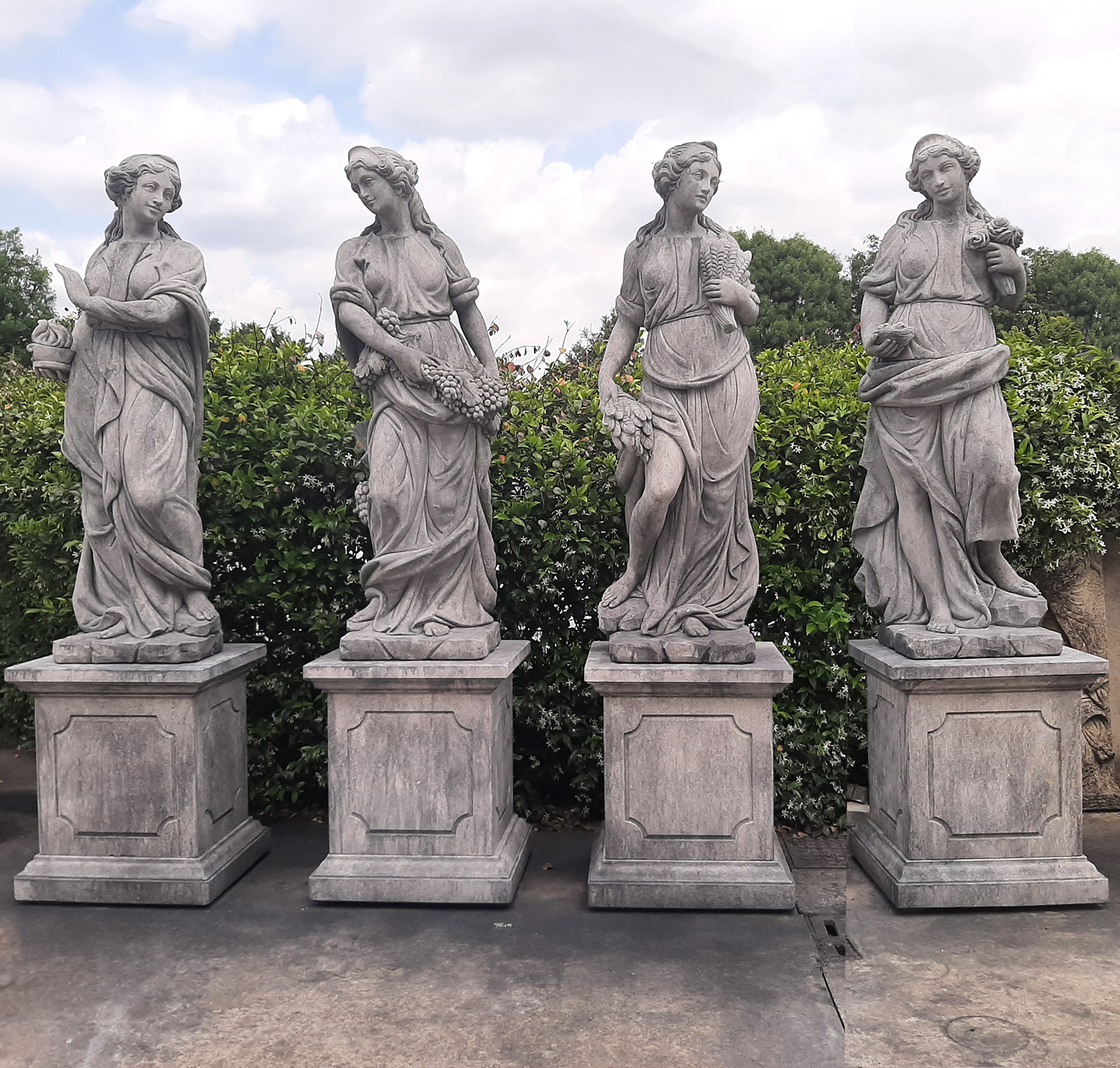 Four Seasons Garden Statues in Carved Limestone from Italy